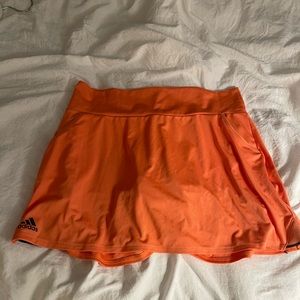 Orange adidas tennis skort
